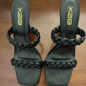Trendy black braided strap heels